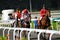 Brett Prebble giving Lucky Nine a pet after winning Krisflyer International Sprint 2013