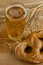 Bretzels and beer on wooden background. Oktoberfest food