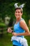 BREVARD, NC-MAY 28, 2016 - Female runner in a white squirrel costume in the White Squirrel Race with over 350 runners in Brevard