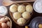 Brevidade is a traditional Brazilian sweet cake made of cassava starch, in a basket, on a rustic wooden table