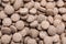 Brewer`s yeast tablets as background, closeup view