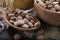 Brewer`s yeast tablets on wooden table, closeup