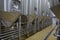 A brewery building interior, container cooking pots