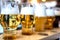 Brewery tasting with five glasses of different color and opacity of the drink. Blurred and indistinguishable background of the