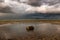 A brewing storm on an ocean sunset