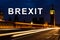 Brexit or british exit with Light trail in the night at Big Ben