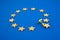 Brexit concept. The figure pushes one star out of the Europen Union Flag