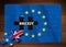 Brexit - Puzzle flag of the European Union on wooden background