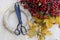 Briar and leaves wreath ingredients on wooden table