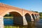 Brick bridge across the Venta river