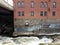 Brick building and rapids in river in Sherbrooke, Canada