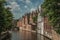 Brick buildings on the canal in a sunny day at Bruges