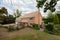 Brick built traditional house front and driveway