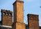 Brick chimneys on the roof of an old building. Smoke stack