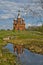 A brick Church on the water in Russia
