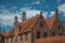 Brick facade of houses in street of Bruges