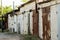 Brick garages with metal gates of a garage cooperative