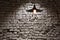 Brick grunge wall and ceiling lamp, copy space