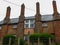 Brick house with four chimneys in the provincial town of Devon in the southeast of England, Crediton, 2018