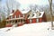 Brick House on a Snowy Hillside