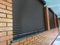 Brick House Windows with rolling shutter for house protection