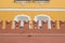 Brick Kremlin wall with battlements and yellow Arsenal building