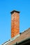 Brick smoke stack on the roof