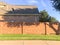 Brick sound walls residential houses with satellite tv in Dallas