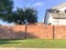 Brick sound walls residential houses with satellite tv in Dallas