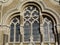 Brick synagogue building detail with stone decorated windows