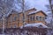 Brick two-storey house in the suburbs in winter