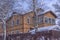 Brick two-storey house in the suburbs in winter