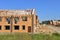 brick under construction site with wooden roof stone and concrete