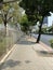 Brick walkways or sidewalks with remote view Long paved brick sidewalk Street walkway Rama 1 Road, Bangkok, Thailand