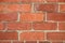 Brick wall with angular stones