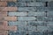 Brick wall background  - tiled black and red bricks