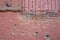 Brick wall with bullet marks