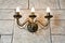 Brick wall chandelier in style of candlestick