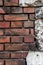 Brick wall combined with cement plaster