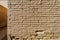 Brick Wall with Cuneiform Script Engraved on it inside Babylon City