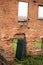 The a brick wall and doors in a building in Shasta Historic Village