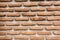 Brick wall with a large layer of mortar