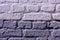 Brick wall painted two colors white and grey stripes close-up. Background white with gray horizontally texture brickwork.