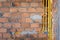 Brick wall in residential house building construction site