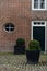 Brick Wall and Round Window, Traditional Dutch House in Veere, Zeeland, Netherlands