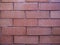 Brick wall, stone, red wall Red brick baked clay abstract background