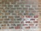 A brick wall. Very suitable for a background. Mixed with cement and sand..