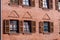 Brick wall with window and wodden shutters