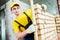 Bricklayer builder worker laying bricks wall