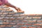 Bricklayer building wall isolated on whitebricklayer building